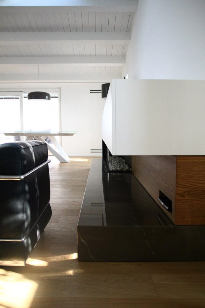 Detail of the furniture-fireplace in the renovated apartments of the building in Capo d'Orlando (Messina).