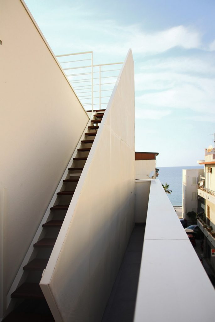 External staircase in the renovated apartments of the building in Capo d'Orlando (Messina).