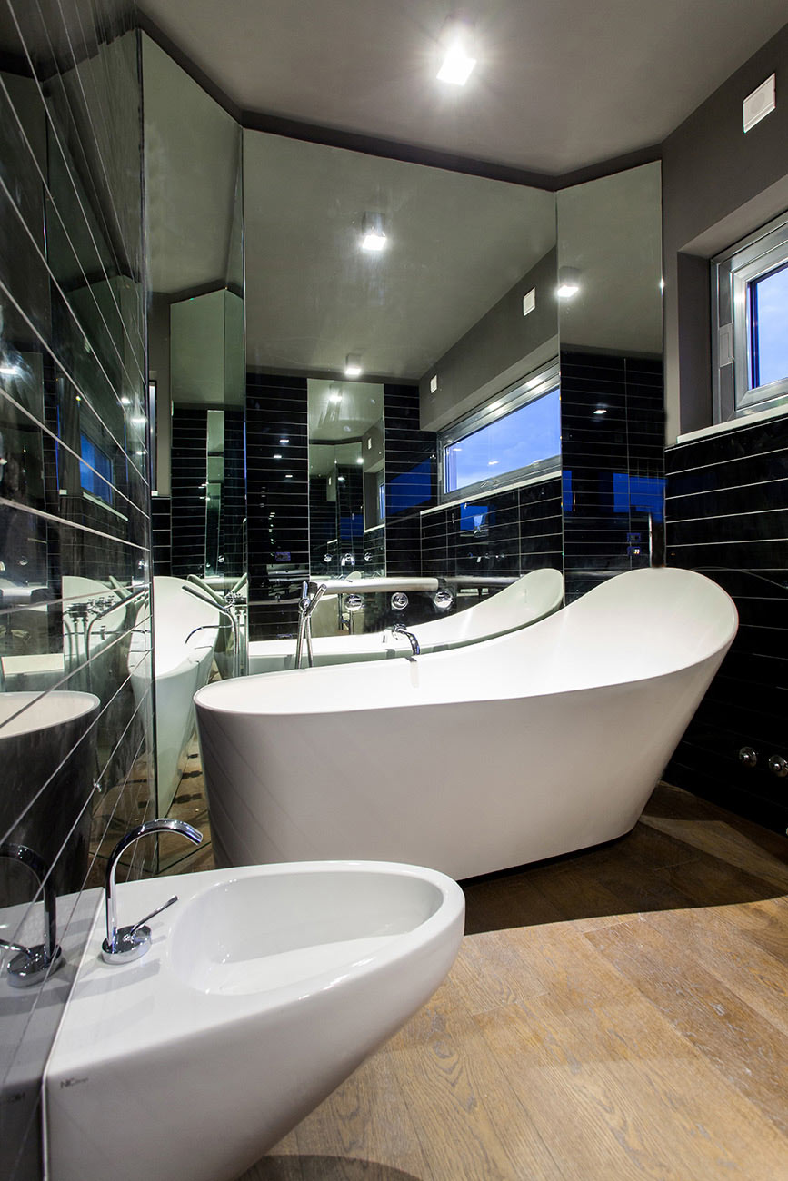 Bathroom consisting of a sink and a bathtub at the bottom