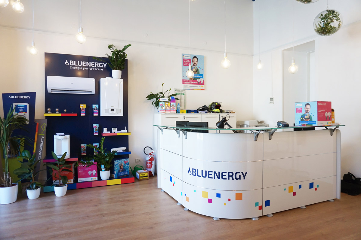 Reception counter inside the shop with wall display products