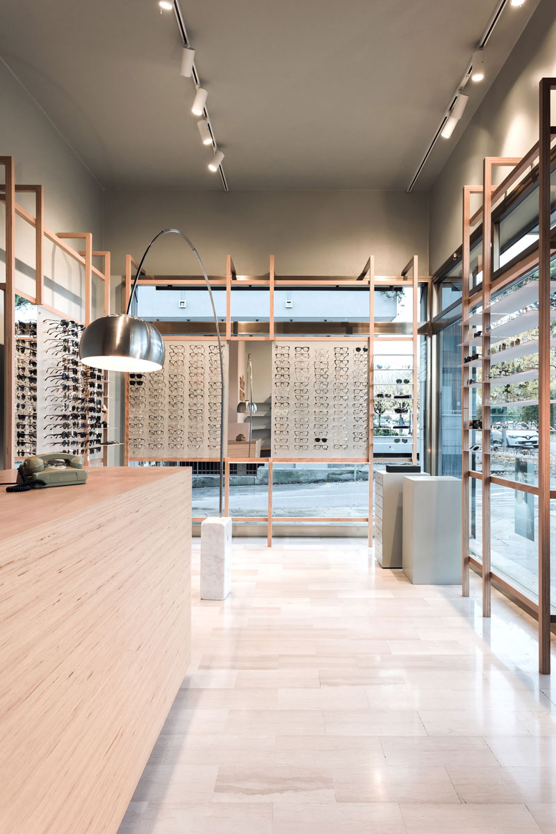 Exhibition hall of the store full of shelves full of glasses