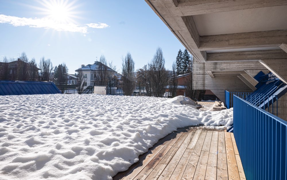 Wooden flooring covered with snow