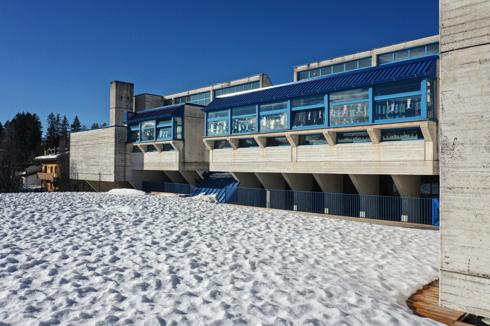 Snow-covered roof of a school