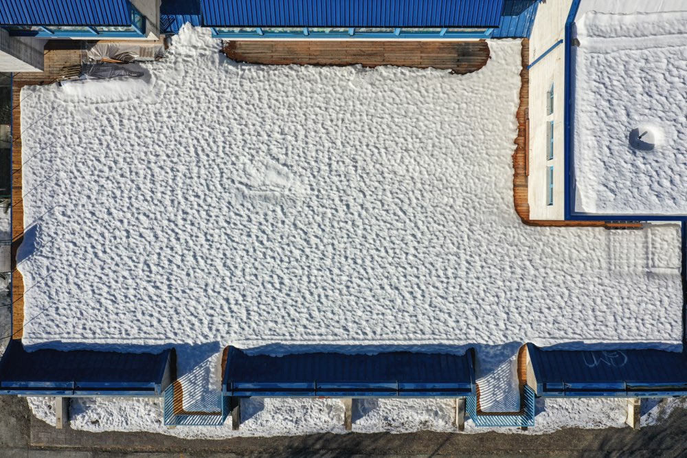 Snow covered roof top view