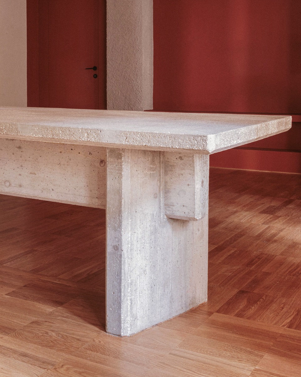 Textural harmony in the Four Spaces living room with concrete table